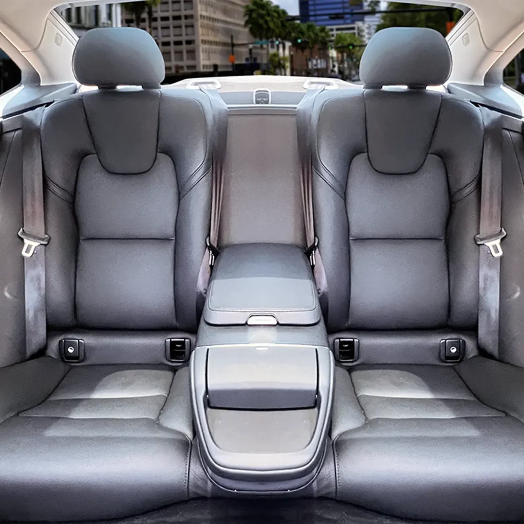 Executive Sedan rear leather seats with fold-down center armrest.