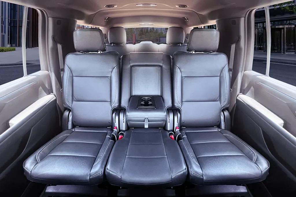 SUV-Suburban second row leather chairs with center console.