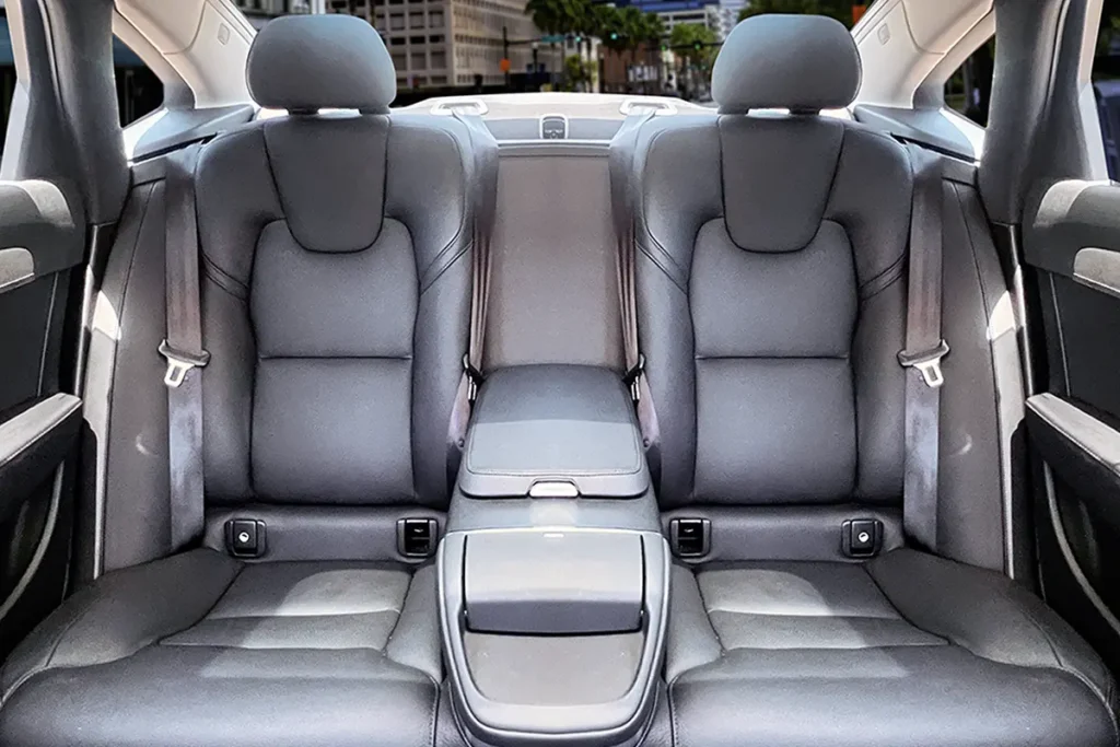Executive Sedan rear leather seats with fold-down center armrest.