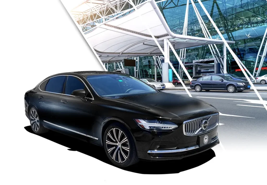 Echo East Coast Transportation Executive Sedan Black outside an airport terminal